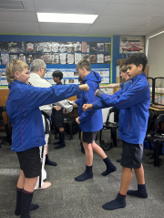 Students try Taekwondo