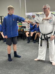 Students try Taekwondo