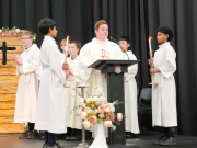 Rosmini students receive Confirmation and First Holy Communion