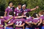 Rosmini dominates Kyocera 1A opener