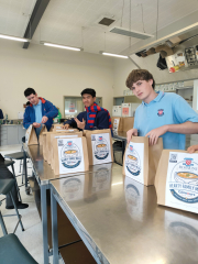 Rosmini Volunteers dispatch first 35 food bags to De Paul House